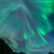 Image for article titled Mesmerizing Aurora in Dramatic Landscapes of Fire, Ice, and Shadow